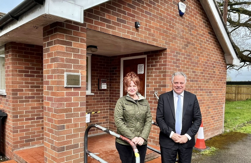 Simon Baynes MP and Sarah Atherton MP outside Hanmer Surgery