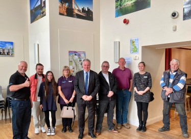 Simon Baynes with David Metcalfe (left) and members of the public at the Ebenezer Chapel