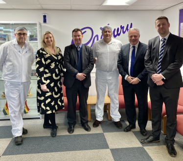 Leighton Prince (Site Engineer), Amy Berry (Feedstocks Quality Manager), Minister for Employment, Phil Davies (Site Operations Lead), Simon Baynes MP and Andrew Roache (UK&I External Affairs Lead)